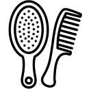 Icône d'une brosse et d'un peigne